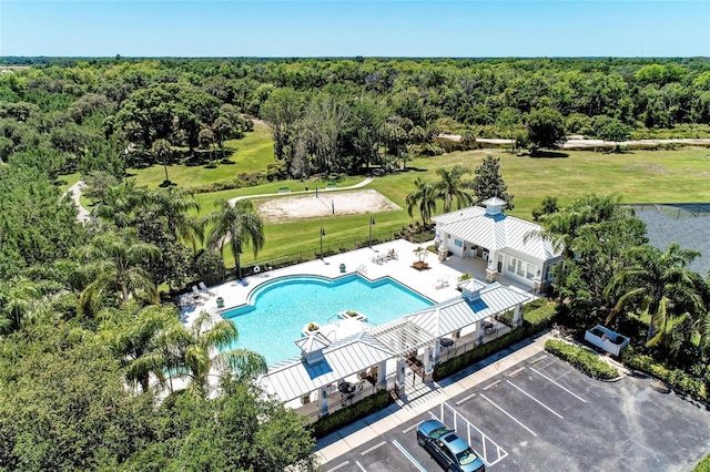 1219 Thornbury Dr, Parrish, FL 34219 - bird's eye view of a heavily wooded area and a pool area