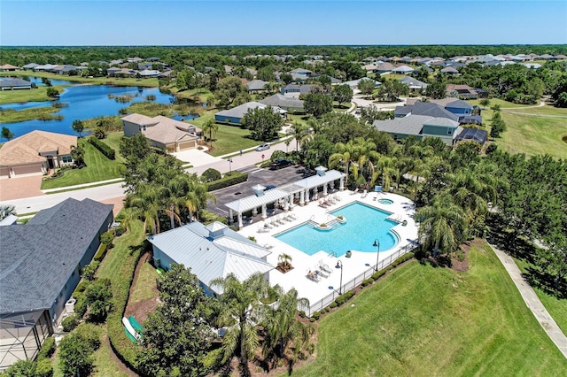 1219 Thornbury Dr, Parrish, FL 34219 - aerial perspective of suburban area with a nearby body of water and a pool area
