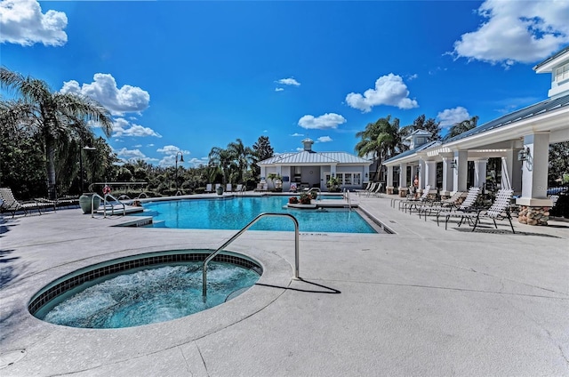 1219 Thornbury Dr, Parrish, FL 34219 - community pool featuring a patio area and a community hot tub