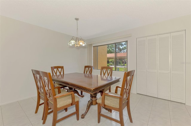 933 Sunridge Way Unit B5, Sarasota, FL 34234 - dining area with a chandelier and light tile patterned floors