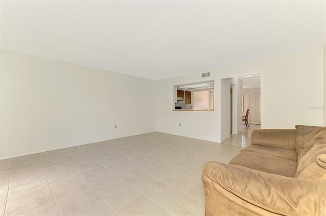933 Sunridge Way Unit B5, Sarasota, FL 34234 - living area featuring light tile patterned floors