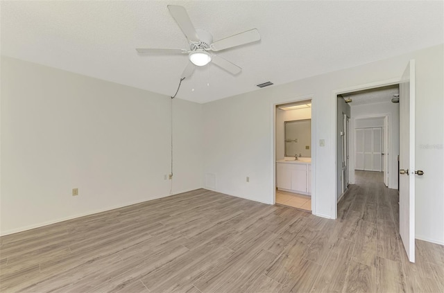933 Sunridge Way Unit B5, Sarasota, FL 34234 - spare room with light wood-style flooring and ceiling fan