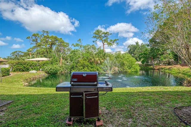 933 Sunridge Way Unit B5, Sarasota, FL 34234 - view of home's community featuring a water view and a yard