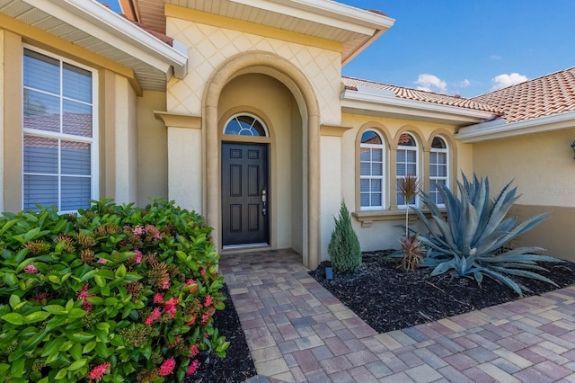 9719 Discovery Ter, Bradenton, FL 34212 - view of exterior entry featuring stucco siding