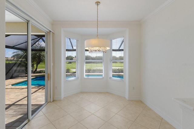 9719 Discovery Ter, Bradenton, FL 34212 - unfurnished dining area with ornamental molding, light tile patterned floors, and a chandelier