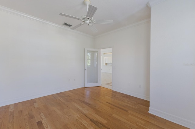 9719 Discovery Ter, Bradenton, FL 34212 - empty room with ceiling fan, crown molding, and light wood-type flooring