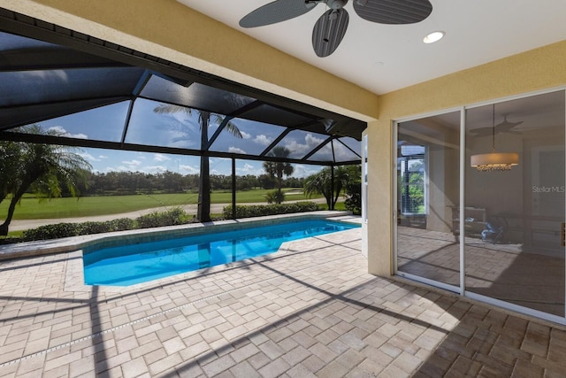 9719 Discovery Ter, Bradenton, FL 34212 - swimming pool with ceiling fan, a patio, golf course view, and a lanai