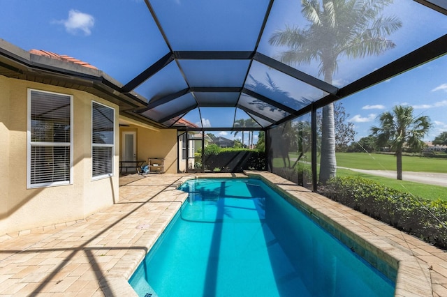 9719 Discovery Ter, Bradenton, FL 34212 - swimming pool featuring a patio area and glass enclosure