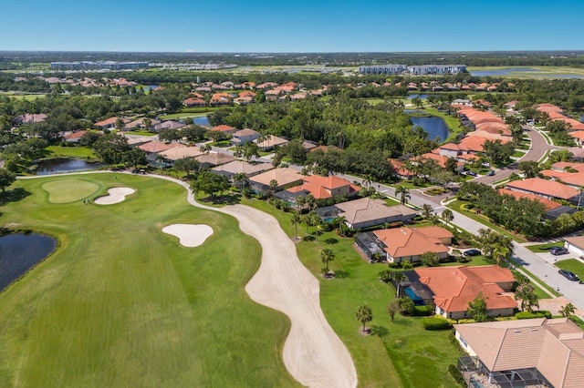 9719 Discovery Ter, Bradenton, FL 34212 - aerial overview of property's location with nearby suburban area, a nearby body of water, and a golf club