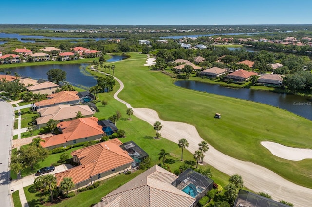 9719 Discovery Ter, Bradenton, FL 34212 - aerial view of residential area featuring a golf club and a nearby body of water