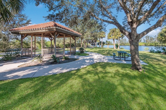 9719 Discovery Ter, Bradenton, FL 34212 - view of home's community featuring a gazebo, a lawn, and a water view