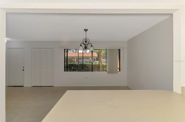 935 Sunridge Way Unit B4, Sarasota, FL 34234 - unfurnished dining area featuring a chandelier