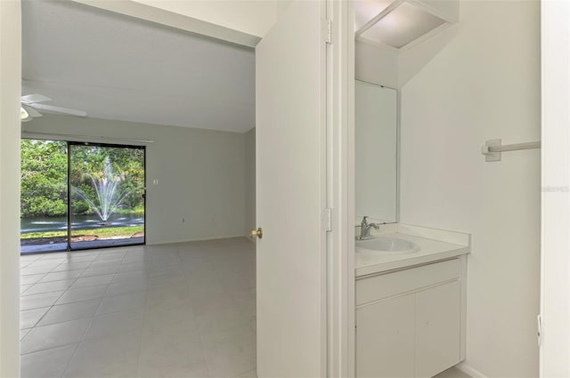 935 Sunridge Way Unit B4, Sarasota, FL 34234 - bathroom with vanity, a ceiling fan, and tile patterned floors
