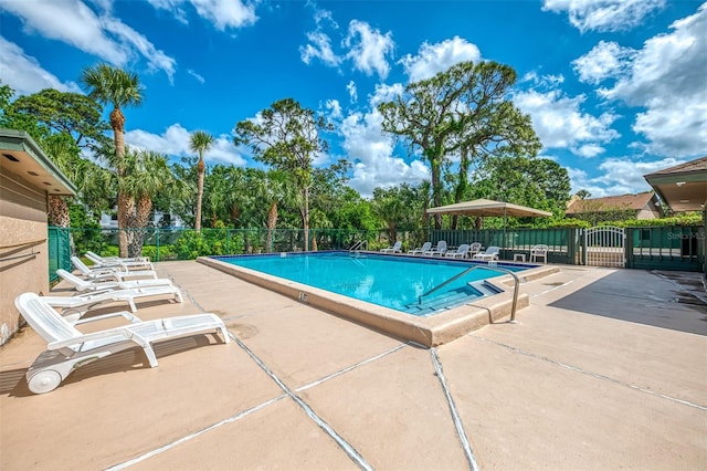 935 Sunridge Way Unit B4, Sarasota, FL 34234 - community pool featuring a patio