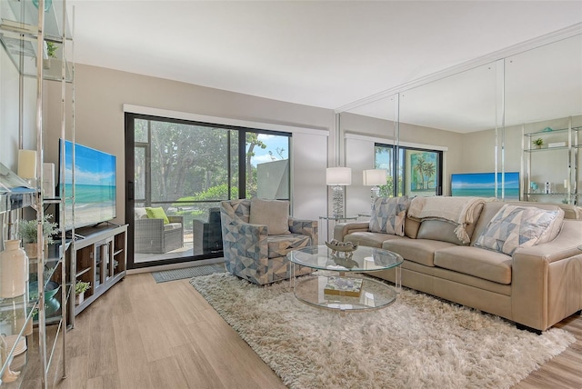 2055 Gulf Of Mexico Dr Unit G2-108, Longboat Key, FL 34228 - living room with wood finished floors
