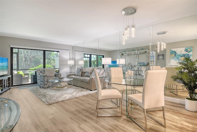 2055 Gulf Of Mexico Dr Unit G2-108, Longboat Key, FL 34228 - dining area with wood finished floors