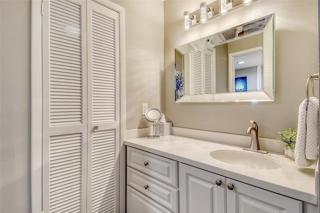 2055 Gulf Of Mexico Dr Unit G2-108, Longboat Key, FL 34228 - bathroom with a closet and vanity