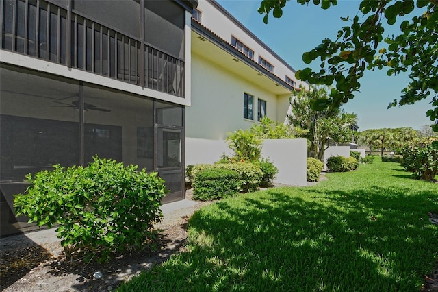 2055 Gulf Of Mexico Dr Unit G2-108, Longboat Key, FL 34228 - view of green lawn with a ceiling fan