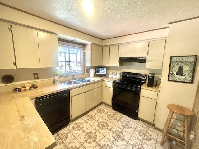 4042 S Lockwood Ridge Rd, Sarasota, FL 34231 - kitchen featuring black appliances, under cabinet range hood, a sink, light countertops, and a textured ceiling