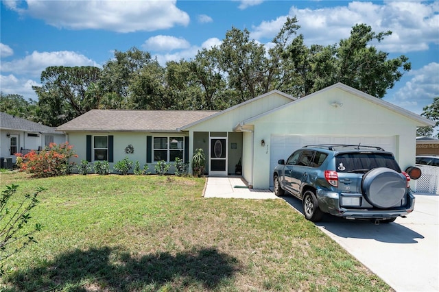 712 68th Ave W, Bradenton, FL 34207 - ranch-style home featuring a garage, concrete driveway, a front lawn, and cooling unit