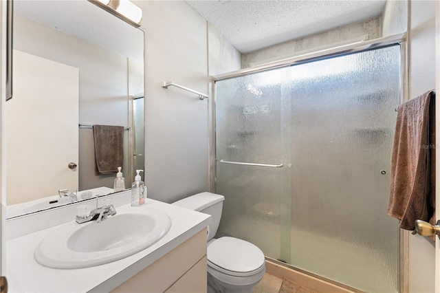 712 68th Ave W, Bradenton, FL 34207 - full bathroom with toilet, vanity, a shower stall, and a textured ceiling