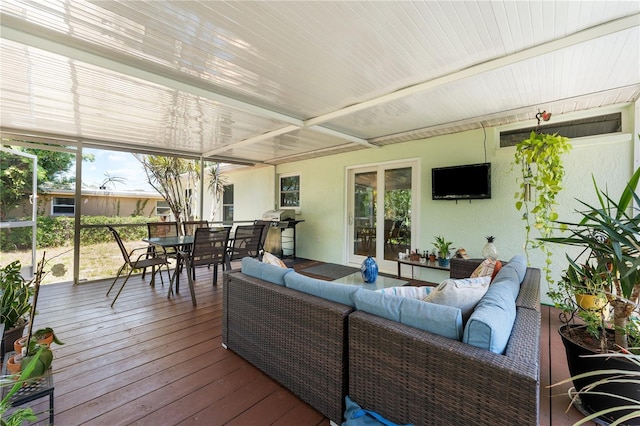 712 68th Ave W, Bradenton, FL 34207 - sunroom featuring an outdoor living space and outdoor dining area