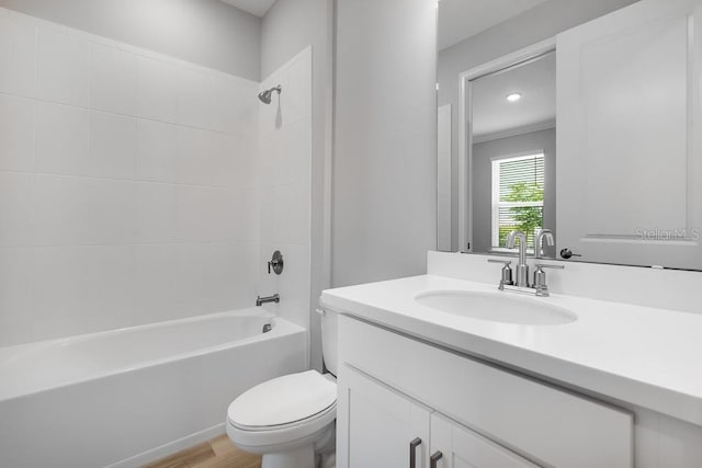 3204 Torta Ct, Bradenton, FL 34211 - bathroom with vanity, washtub / shower combination, and wood finished floors