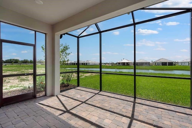 3204 Torta Ct, Bradenton, FL 34211 - unfurnished sunroom with a water view and a residential view
