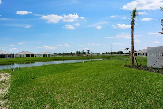 3204 Torta Ct, Bradenton, FL 34211 - view of green lawn featuring a water view and a residential view