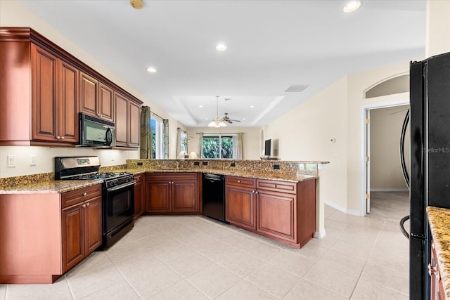 138 Tiziano Way N, Venice, FL 34275 - kitchen featuring black appliances, recessed lighting, light tile patterned flooring, a ceiling fan, and light stone counters
