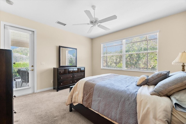 138 Tiziano Way N, Venice, FL 34275 - bedroom with access to exterior, light carpet, ceiling fan, and baseboards