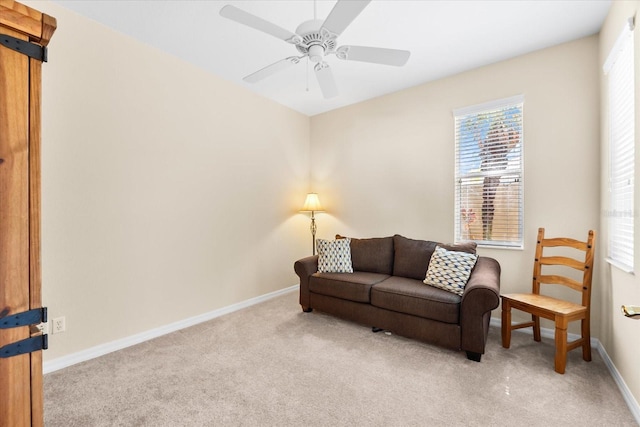 138 Tiziano Way N, Venice, FL 34275 - living room with light colored carpet, ceiling fan, and baseboards