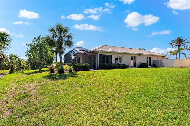 138 Tiziano Way N, Venice, FL 34275 - rear view of house featuring stucco siding and a lanai