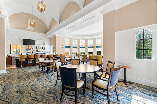138 Tiziano Way N, Venice, FL 34275 - dining space with baseboards and high vaulted ceiling