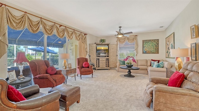 12520 Natureview Cir, Bradenton, FL 34212 - carpeted living area featuring a ceiling fan