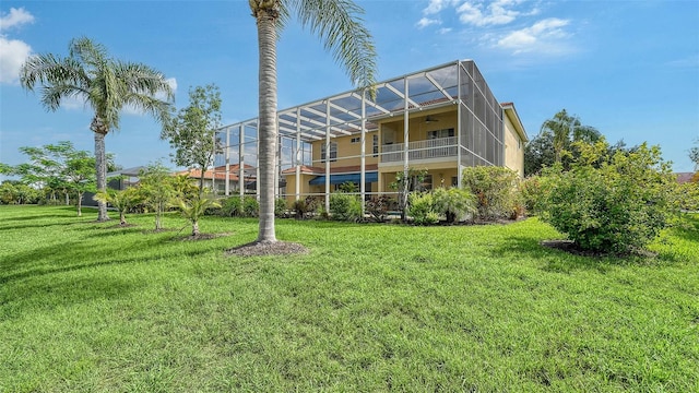12520 Natureview Cir, Bradenton, FL 34212 - back of property featuring a yard, a lanai, and a ceiling fan