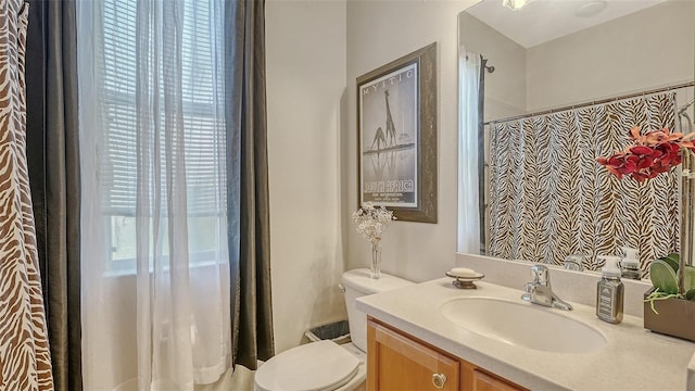 12520 Natureview Cir, Bradenton, FL 34212 - bathroom with plenty of natural light, toilet, vanity, and a shower with curtain