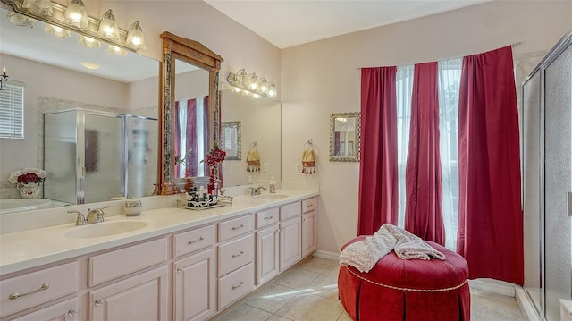 12520 Natureview Cir, Bradenton, FL 34212 - full bathroom with a shower stall, double vanity, tile patterned flooring, and a bath