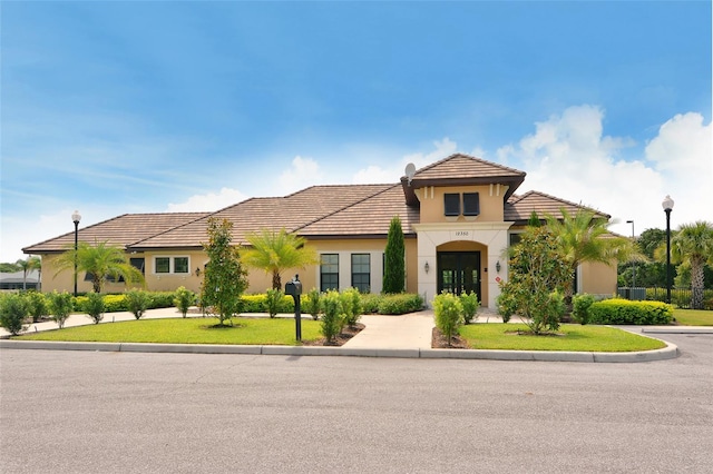 12520 Natureview Cir, Bradenton, FL 34212 - mediterranean / spanish-style house featuring stucco siding and a tiled roof