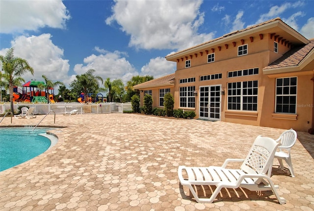 12520 Natureview Cir, Bradenton, FL 34212 - community pool featuring a patio and a playground