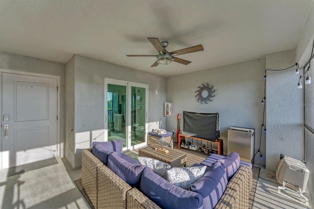 14257 Heritage Landing Blvd Unit 1122, Punta Gorda, FL 33955 - living room with a ceiling fan and a textured wall