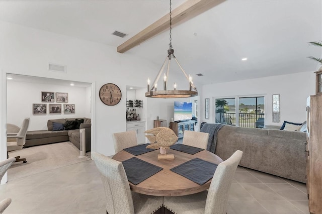 14257 Heritage Landing Blvd Unit 1122, Punta Gorda, FL 33955 - dining space with beamed ceiling, light tile patterned floors, high vaulted ceiling, and a chandelier