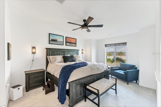 14257 Heritage Landing Blvd Unit 1122, Punta Gorda, FL 33955 - bedroom with light colored carpet, ceiling fan, and baseboards