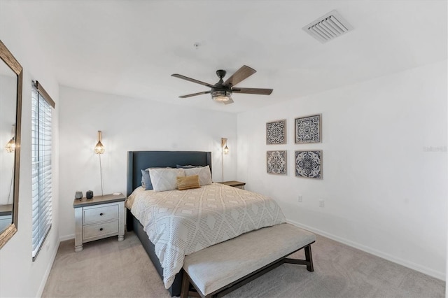 14257 Heritage Landing Blvd Unit 1122, Punta Gorda, FL 33955 - bedroom with light carpet, baseboards, and a ceiling fan