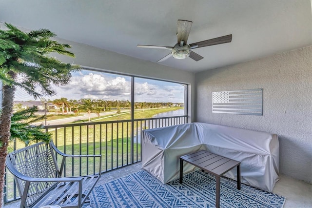 14257 Heritage Landing Blvd Unit 1122, Punta Gorda, FL 33955 - sunroom featuring ceiling fan and a water view
