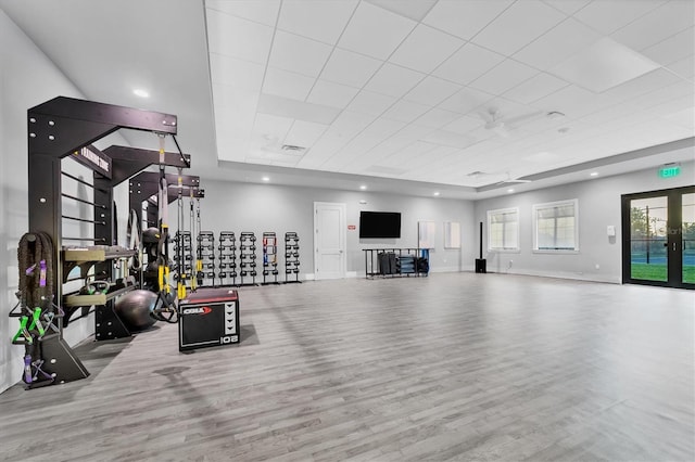 14257 Heritage Landing Blvd Unit 1122, Punta Gorda, FL 33955 - exercise room with wood finished floors, baseboards, and a paneled ceiling