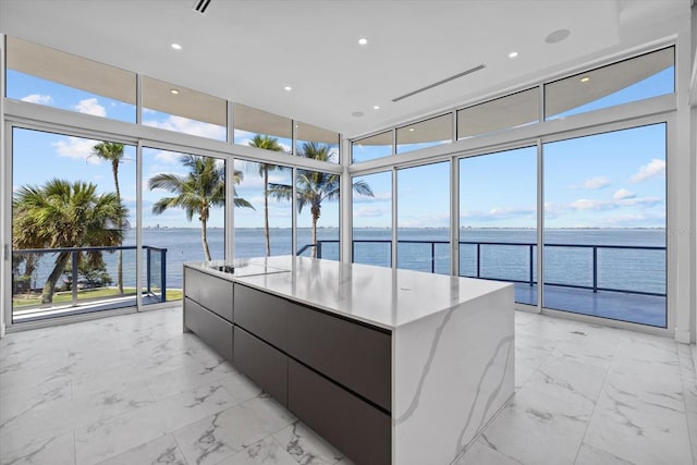 4035 Bay Shore Rd, Sarasota, FL 34234 - unfurnished sunroom with healthy amount of natural light and a water view