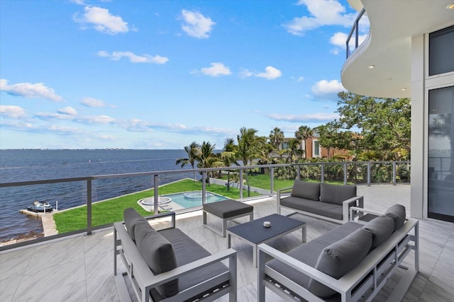 4035 Bay Shore Rd, Sarasota, FL 34234 - patio / terrace featuring a water view and an outdoor living space