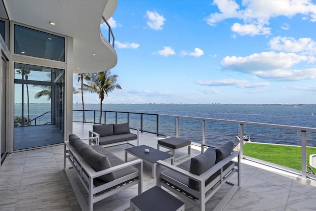 4035 Bay Shore Rd, Sarasota, FL 34234 - view of patio / terrace with a water view and an outdoor hangout area