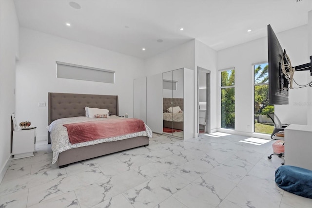 4035 Bay Shore Rd, Sarasota, FL 34234 - bedroom featuring recessed lighting, marble look tile flooring, and access to exterior